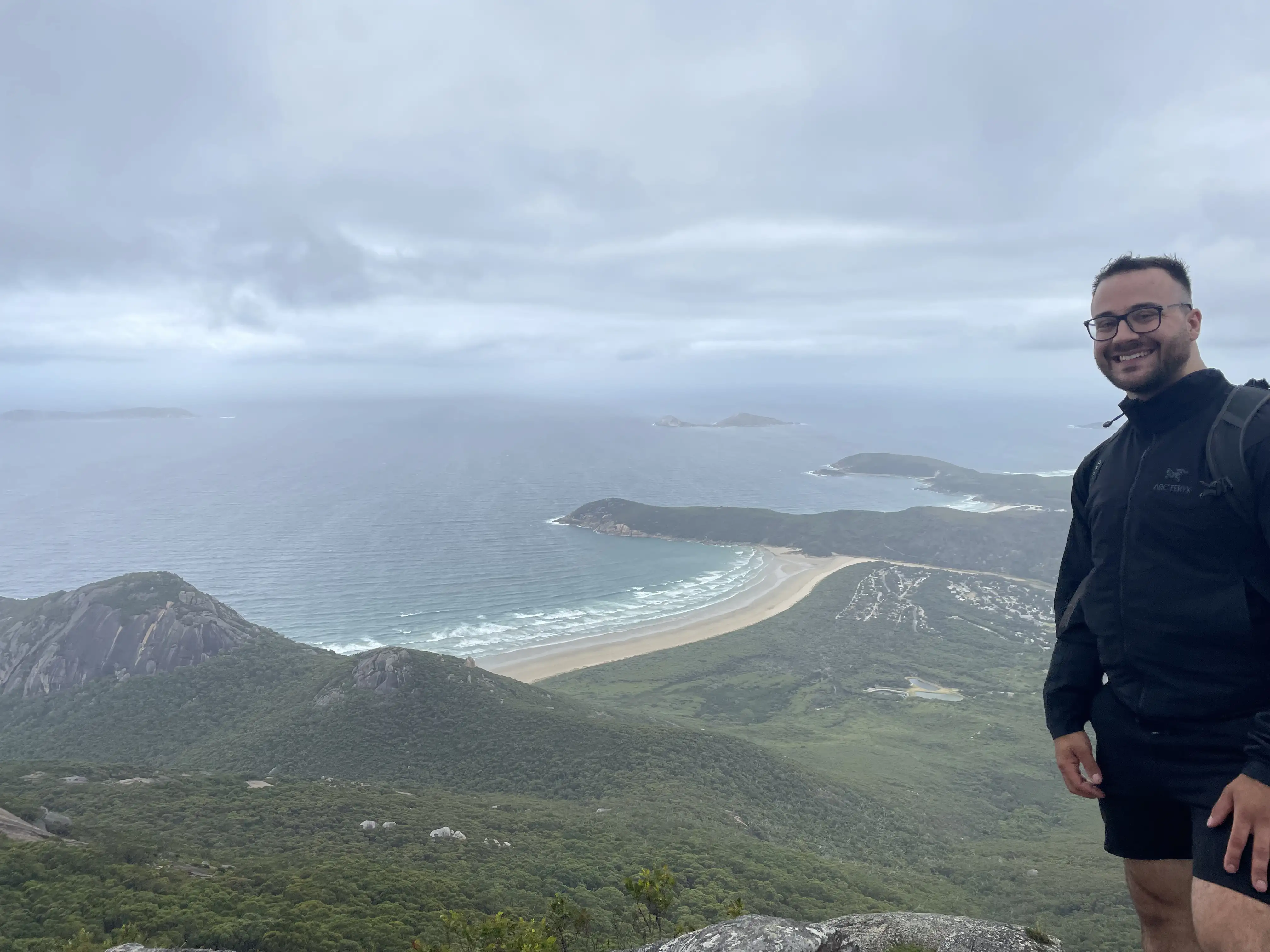 Me at Wilson Promotory Hike, Australia, with Ocean and Island View, representing Work Life Balance